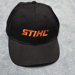 STIHL Black Baseball Cap - orange spell out - SALE